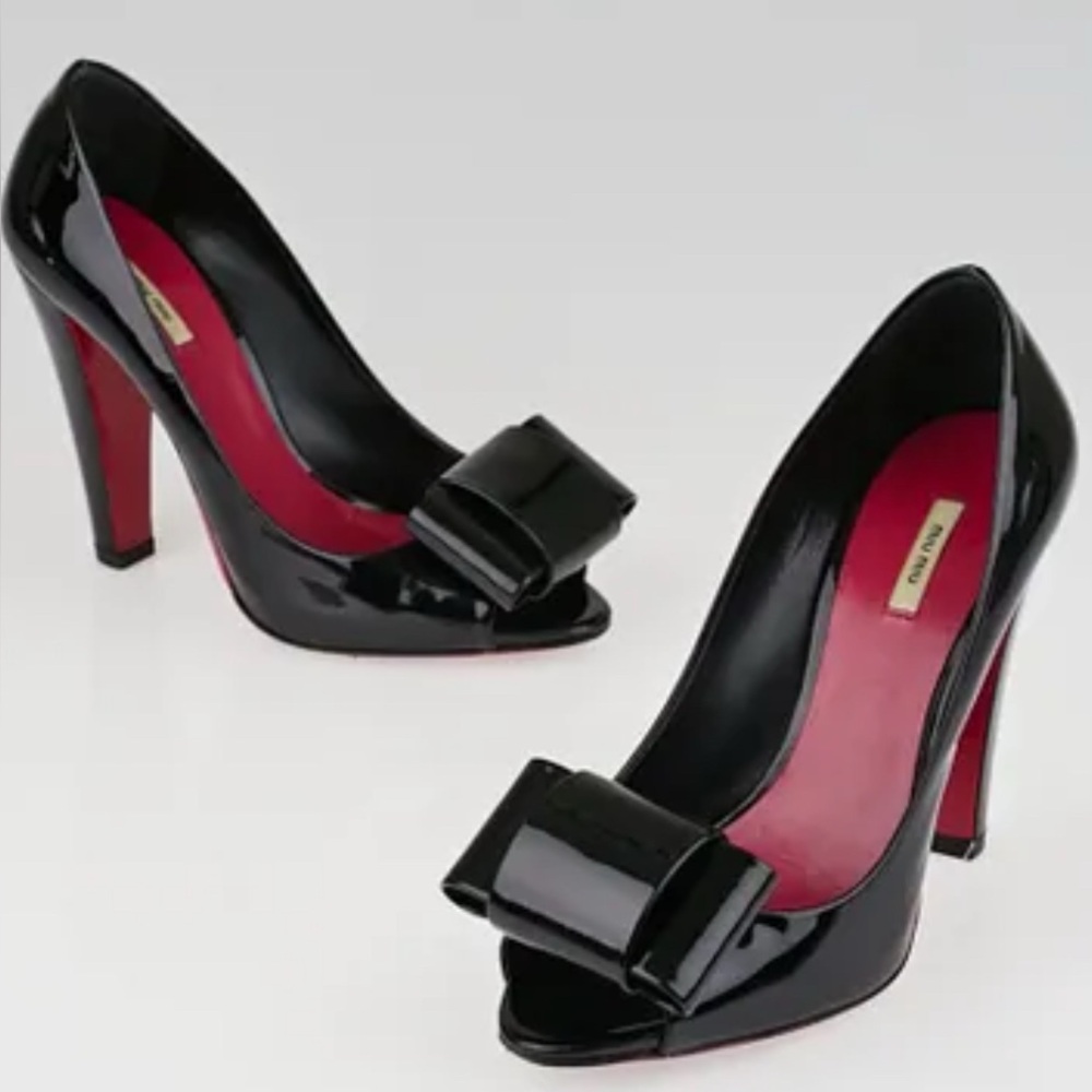 Miu Miu Peep Toe bow pumps in size 39